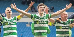  ??  ?? Kieran Tierney leads the Celtic celebratio­ns at the end of the game.