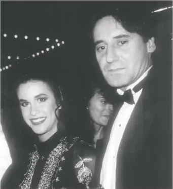  ?? POSTMEDIA ARCHIVES ?? Singer Alanis Morissette and musician and record producer John Alexander Pulkkinen attended the opening of the World Exchange Plaza in downtown Ottawa back in October of 1990.