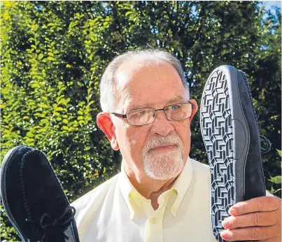  ?? Picture: Steve Macdougall. ?? Sam Purdie from Perth, with the slippers he bought online.