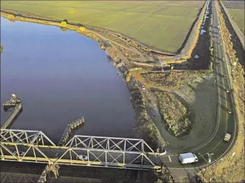  ?? Carlos Avila Gonzalez San Francisco Chronicle ?? A WATER advocacy group is criticizin­g the governor’s Delta Conveyance Project, which would build a tunnel to transport water beneath the Sacramento-San Joaquin River Delta, seen above in Discovery Bay, Calif.