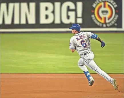  ??  ?? Mets left fielder Jeff Mcneil runs the bases against the Marlins on May 18 in Miami. If Tuesday’s All-star Game goes to extra innings, each inning’s half will begin with an automatic runner at second base. STEVE MITCHELL/USA TODAY SPORTS