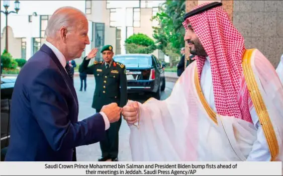  ?? Saudi Press Agency/AP ?? Saudi Crown Prince Mohammed bin Salman and President Biden bump fists ahead of their meetings in Jeddah.