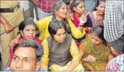  ?? PTI PHOTO ?? Bhumata Ranragini Brigade leader Trupti Desai (centre) outside the Shani Shingnapur temple on Saturday.