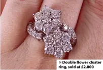  ??  ?? > Double flower cluster ring, sold at £2,800