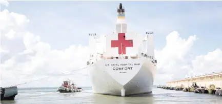  ?? (US Navy/Reuters) ?? THE US NAVY hospital ship ‘USNS Comfort’ departs on Tuesday from Naval Station Norfolk, in Virginia, ahead of Hurricane Florence.