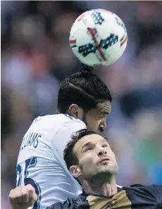  ?? THE CANADIAN PRESS/FILES ?? Sheanon Williams gets above Philadelph­ia Union’s Chris Pontius as they vie for the ball during a game on March 5.