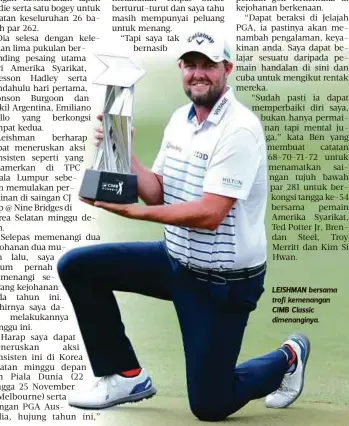  ??  ?? LEISHMAN bersama trofi kemenangan CIMB Classic dimenangin­ya.