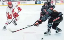  ?? JOVANNY HERNANDEZ / JOURNAL SENTINEL ?? Wisconsin forward Lacey Eden, left, ranks second on the team in scoring this season with 17 goals and 23 assists.