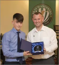  ??  ?? Andrew Moran, U-15 Player of the Year, accepts his award from Keith Ryan.