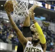  ?? DARRON CUMMINGS — THE ASSOCIATED PRESS FILE ?? Thursday Pacers general manager and president of basketball operations Kevin Pritchard finally made the stunning blockbuste­r trade official by announcing four-time All-Star Paul George, pictured, was heading to Oklahoma City in exchange for Victor...
