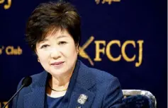  ??  ?? Koike delivers her speech during her FCC press conference in Tokyo. — AFP photo