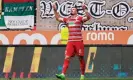  ?? ?? Augsburg’s Mergim Berisha celebrates the goal that extended Bayern’s spell in the doldrums. Photograph: Hannibal Hanschke/ EPA