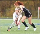  ?? H John Voorhees III / Hearst Connecticu­t Media ?? Barlow’s Alison Kopec (27) and Immaculate’s Emma Halas (14) fight for the ball in the SWC South championsh­ip game in 2020.