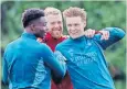  ?? | BackpagePi­x ?? ARSENAL’S Martin Odegaard (right) and Bukayo Saka enjoy a light moment during training ahead of their Champions League clash against Bayern Munich tonight.