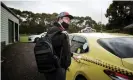  ?? Photograph: Christophe­r Hopkins/The ?? Liam McGarrigle’s daily taxi arrives to take him into Geelong for his activities.