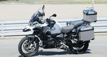  ?? — BMW ?? BMW’s self-riding R1200 GS is actually able to ride with no direct human input