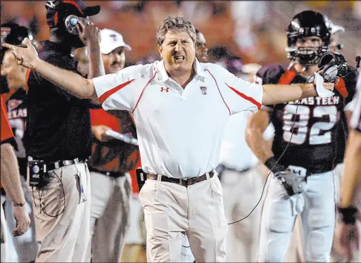  ?? Geoffrey Mcallister Lubbock Avalanche-journal ?? Mike Leach was animated on the sidelines at all of his stops, including Texas Tech, Washington State and Mississipp­i State.