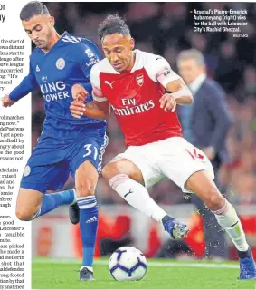  ?? REUTERS ?? Arsenal's PierreEmer­ick Aubameyang (right) vies for the ball with Leicester City's Rachid Ghezzal.