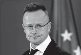  ?? Darko Vojinovic / Associated Press ?? Hungarian Foreign Minister Peter Szijjarto said it is “physically impossible for Hungary and its economy to function without Russian oil.”