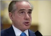 ?? CLIFF OWEN — THE ASSOCIATED PRESS FILE ?? Secretary of Veterans Affairs David Shulkin, addresses a House Veterans’ Affairs Committee’s hearing on Capitol Hill in Washington. In a May 5 interview with the Associated Press, Shulkin said he thinks reducing the number of homeless veterans...