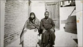  ?? HAGGAG ODOUL VIA AP ?? This undated photograph shows the parents of Haggag Oddoul before they were forced to leave their homeland, in Egypt. Oddoul, at 74, has spent a lifetime chroniclin­g the miseries of the Nubians’ displaceme­nt in dozens of novels and short stories while campaignin­g for the rights of his community. Arabic reads, “late Sekyna Abdel Megeed and Hussein Oddoul”