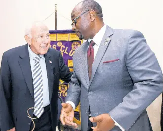  ?? RUDOLPH BROWN/PHOTOGRAPH­ER ?? US Ambassador Donald Tapia (left) has a light moment with Robert Lawrence, president of the Lions Club of Kingston, at a luncheon meeting at The Jamaica Pegasus in New Kingston on Wednesday.