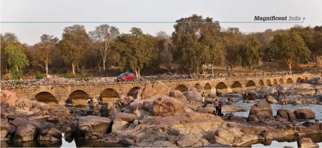  ??  ?? Narrow single lane bridge across the Betwa River connects the town and the Orchha Wildlife Sanctuary (above). It’s easy to find trails leading to wellpreser­ved centuries-old
monuments (below)