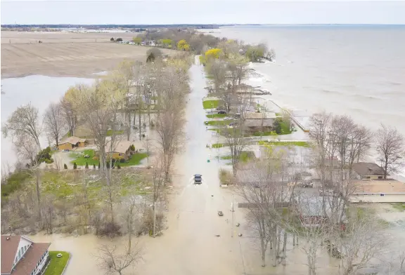  ?? DAX MELMER/WINDSOR STAR ?? Flooding, shoreline erosion and other severe weather events are all related to growing global emissions and their adverse affects on climate change.