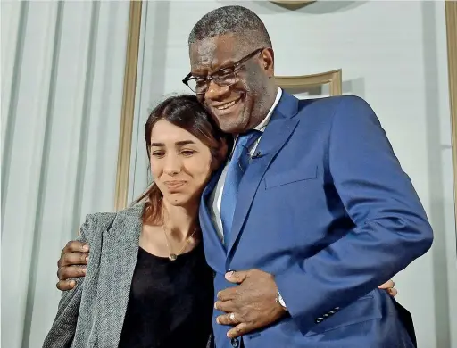  ?? (Afp/tobias Schwarz) ?? I due vincitori L’attivista yazida Nadia Murad, 25 anni, e il medico congolese Denis Mukwege, 63. riceverann­o oggi a Oslo il premio Nobel per la Pace