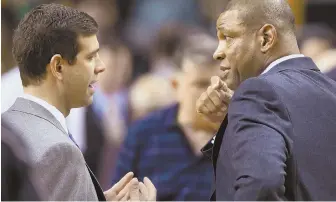  ?? AP PHOTO ?? HEADS OF STATE: Brad Stevens and Doc Rivers met again last night at Staples Center in Los Angeles.