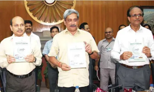  ??  ?? Defence Minister Manohar Parrikar releasing a booklet titled “Department of Defence Production in Pursuit of Self-Reliance” New Delhi, May 26, 2016. Defence Secretary, G. Mohan Kumar and Secretary (Defence Production), A.K. Gupta are also seen.