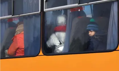  ?? Photograph: Kai Pfaffenbac­h/Reuters ?? ‘There is an acceptance that war is natural in other places, an aberration here.’ Refugees from Ukraine arrive at the Polish border.