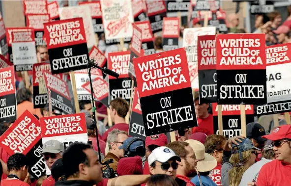  ??  ?? The last Hollywood writers’ strike, in 2007, shut down dozens of TV and movie production­s. Writers are preparing to strike again this week, to protest declining incomes in a changing TV environmen­t.