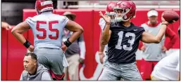  ?? AP/VASHA HUNT ?? ABOVE Alabama quarterbac­k Tua Tagovailoa works through drills during a practice Aug. 3 at Bryant-Denny Stadium in Tuscaloosa, Ala. Alabama has competed in the national title game seven out of the past 10 seasons. LEFT Sonny Dykes, who spent four seasons at California before returning to his roots to take over as coach at SMU when Chad Morris left for Arkansas, said his experience while recruiting in the Pac-12 was different than what he was used to in the South, such as his home state of Texas.