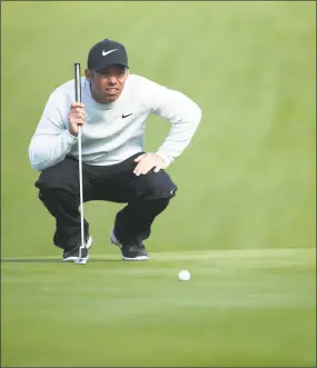  ?? Jeff Gross / Getty Images ?? Paul Casey lines up a putt during the third round of the AT&amp;T Pebble Beach Pro-Am on Saturday.