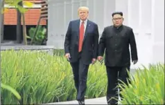  ?? AFP ?? North Korea's leader Kim Jong Un walks with US President Donald Trump.