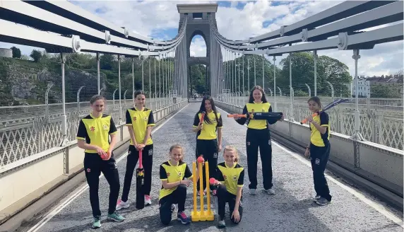  ??  ?? Gloucester­shire players on Clifton Suspension Bridge as part of the promotion for Women’s Big Cricket Month in June