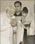  ?? HT FILE ?? Former J& K chief minister Mehbooba ▪
Mufti with PM Narendra Modi