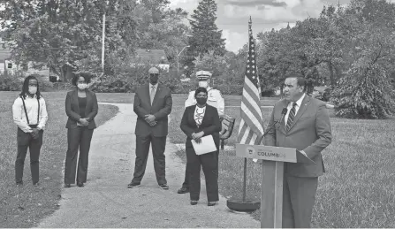  ?? ERIC LAGATTA/THE DISPATCH ?? Columbus Mayor Andrew J. Ginther and other city leaders announce the results of a study into homicide violence during an October news conference in Audobon Park in North Linden.