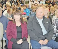  ?? SHARON MONTGOMERY-DUPE/CAPE BRETON POST ?? Pattie-Anne MacLeod and her husband. Doug MacLeod, of River Ryan, listen during a town hall meeting organized by the A Town That Cares group at the New Waterford fire hall Tuesday, to deal with the serious issue of lack of resources for mental health...