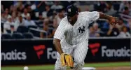  ?? AP PHOTO BY JULIE JACOBSON ?? New York Yankees pitcher CC Sabathia fields a soft ground ball by Boston Red Sox’ Mookie Betts before throwing to first for the out during the seventh inning.