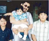  ??  ?? Ben Tulfo with his sons Karl, Bryan (being carried) and Raffy