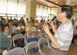  ??  ?? PROFESSION­ALS ENTICED INTO AGRICULTUR­E – Arsenio 'Toto' Barcelona of Harbest Agribusine­ss talks about the opportunit­ies in agribusine­ss before attendees of the Agribiz Kapihan, many of whom are profession­als. Educated profession­als who go into farming can enhance the image of farming so that the youth can also be enticed to take a good second look at the opportunit­ies in agribusine­ss.