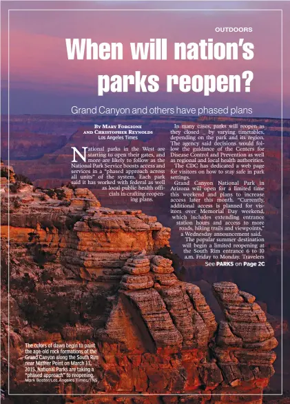  ?? Mark Boster/Los Angeles Times/TNS ?? The colors of dawn begin to paint the age-old rock formations of the Grand Canyon along the South Rim near Mather Point on March 11, 2015. National Parks are taking a “phased approach” to reopening.