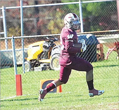  ?? Photos by Ernest A. Brown and Michelle Menard ?? Woonsocket senior receiver Jaylan Lopez, above, scored a nine-yard touchdown in the second quarter, while Eric Agyemang, bottom left, kicked three extra points to lead the Novans to a 35-7 Division II victory over Rogers Saturday at Barry Field. Burrillvil­le’s Bobby Thatcher, bottom right, did just about everything to help the unbeaten Broncos down Westerly, 14-13, at Alumni Field.