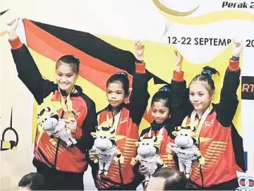  ??  ?? The Sarawak artistic gymnastics team who scored a major surprise.