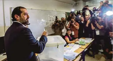  ?? EPA PIC ?? Lebanese Prime Minister Saad Hariri casting his ballot in Baabda, southeast Beirut, Lebanon, on Sunday.