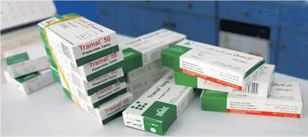  ?? ADEL HANA/AP ?? Boxes of Tramal, an addictive painkiller that gained popularity after the first war between Hamas and Israel in 2009, are stacked in a Gaza pharmacy.