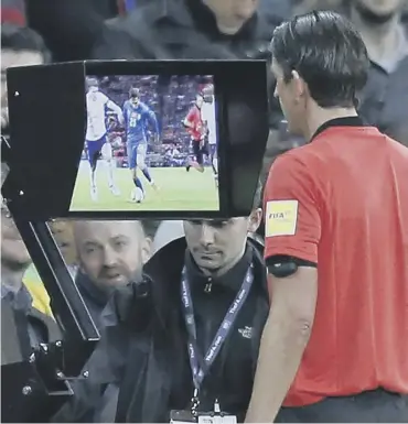  ??  ?? Video Assistant Referees were used at the World Cup in the summer. But it is an expensive system.