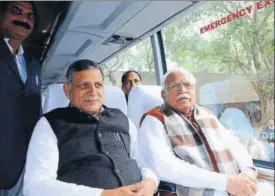  ?? HT PHOTO ?? Haryana CM Manohar Lal Khattar and Vidhan Sabha speaker Kanwar Pal aboard the bus leaving for the threeday Chintin Shivir being organised at Timber Trail Heights, Parwanoo, in Himachal.